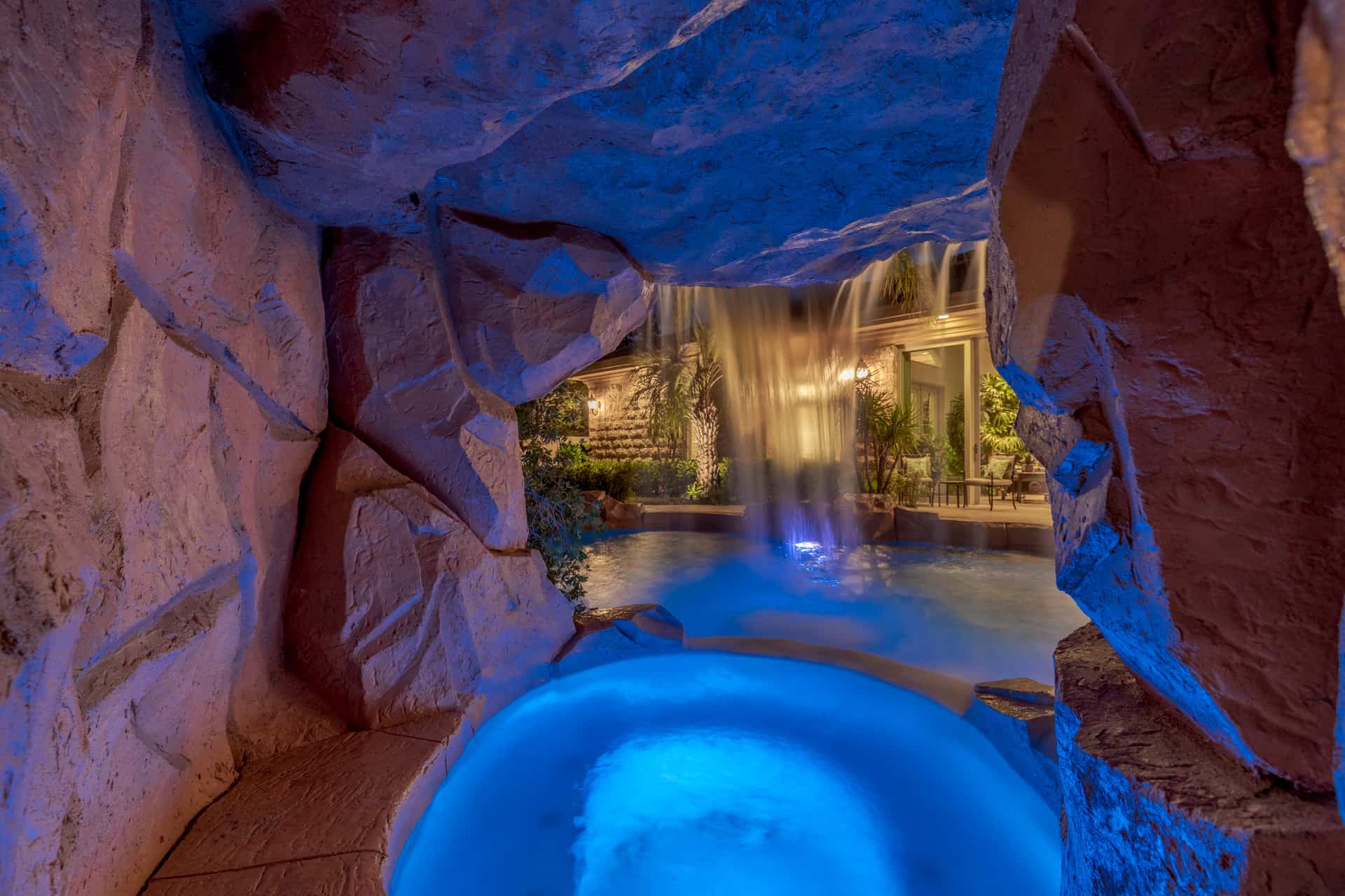 grotto spa with waterfall feature